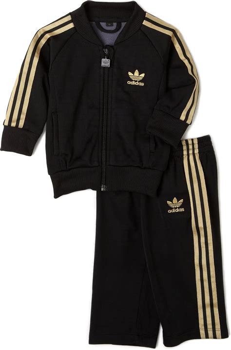 black and gold adidas mens|black and gold adidas sweatsuit.